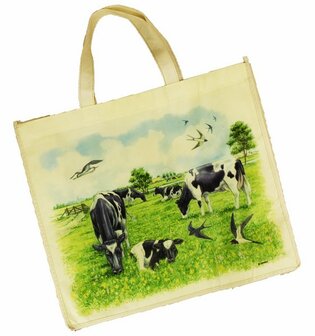 Boodschappen tas  uitgevoerd met koeien print in de wei